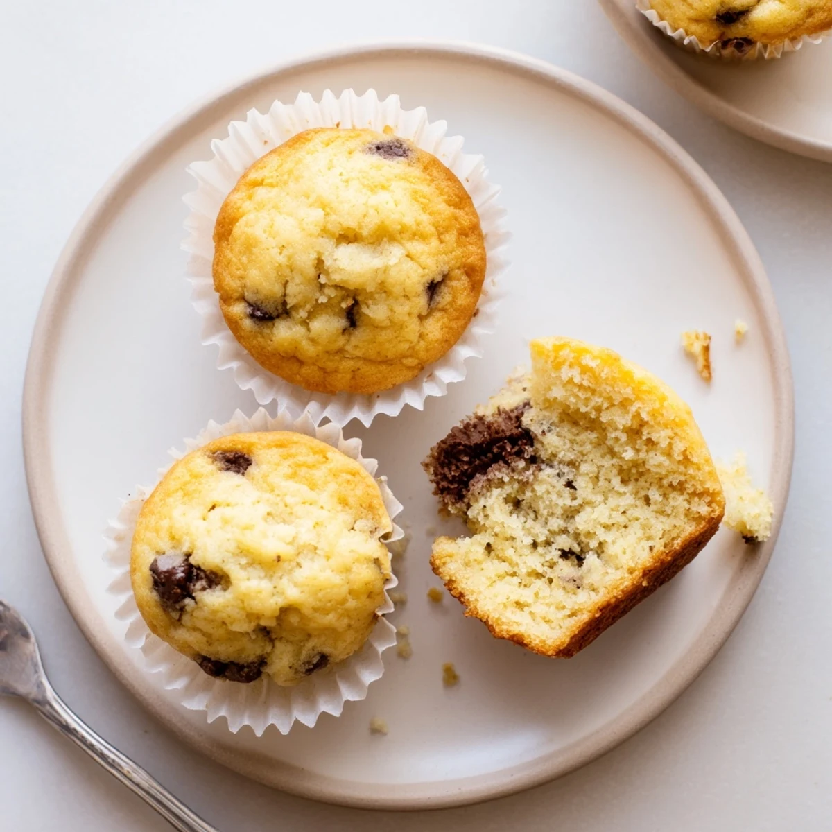 Tray of Little Bites Mini Muffins nestled in liners, perfect breakfast bites